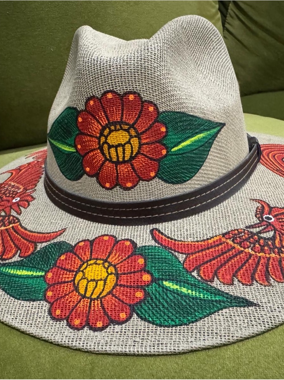 Hand Crafted Beige Straw Hat with Red Floral and Green Leaf Accents - Picture 2 of 5
